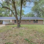 COMPLETELY REMODELED SHREVEPORT HOME FOR SALE!!! Situated on .73 acres, this traditional style brick home is ready for its new owner! This home offers 3 bedrooms, 2 bathrooms, and 1,806 square feet of living space! Upon entering the home, you are greeted with not one but TWO living spaces that can be used however you please! The open floorplan is so inviting! The kitchen boasts electric cooktop and PLENTY of storage and countertop space! The primary suite is spacious AND a relaxing place to retreat! The primary bathroom showcases a walk-in extra-large shower, beautifully designed, as does the secondary bathroom! Step through the French doors to the large, covered patio to enjoy the peace and quiet of country living! NO HOA!!!! This home is priced to SELL! Schedule your showing TODAY!!!!! Mineral rights are reserved.